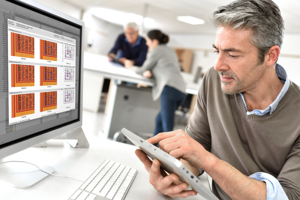 Photo of man using workstation displaying Automation Engine