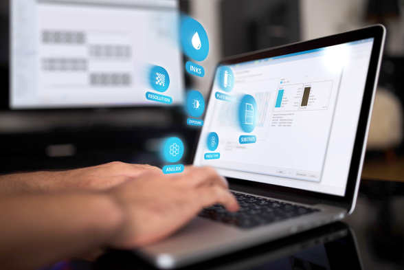 Hands typing on a laptop displaying Print Control Wizard