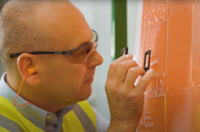 Man inspecting at flexo plate