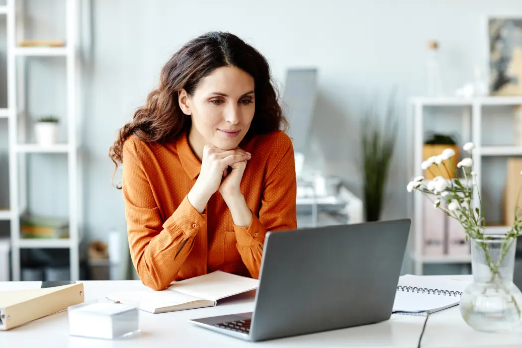 Woman looking at the laptop