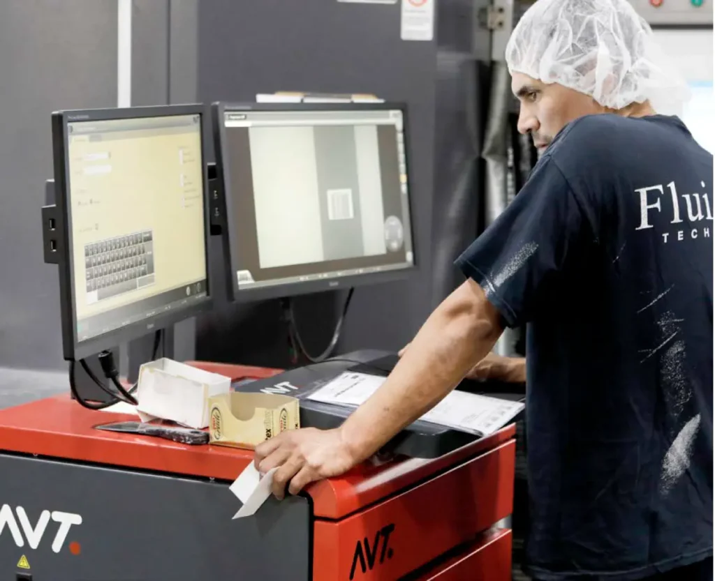 Photo of man at AVT workstation